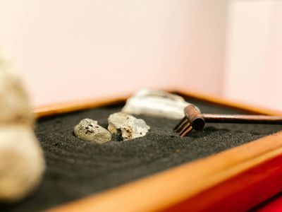 Minimalist Zen garden stones in a training area.